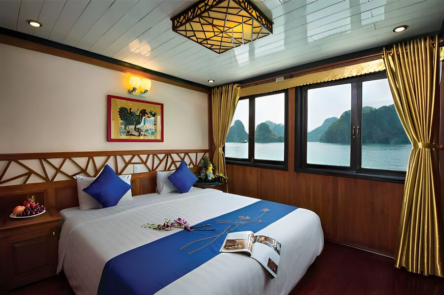 2-Day Royal Palace Ha Long Bay & Ti Top Island Cruise - Day one: lunch, limestone towers, and Ti Top Island