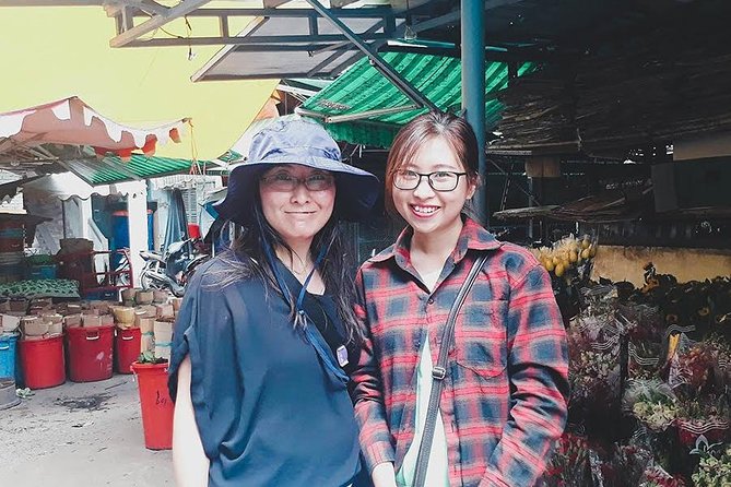 Afternoon Saigon Unseen Adventure by Scooter |Opt: Ao Dai Riders - Ho Thi Ky Flower Market and grilled oysters