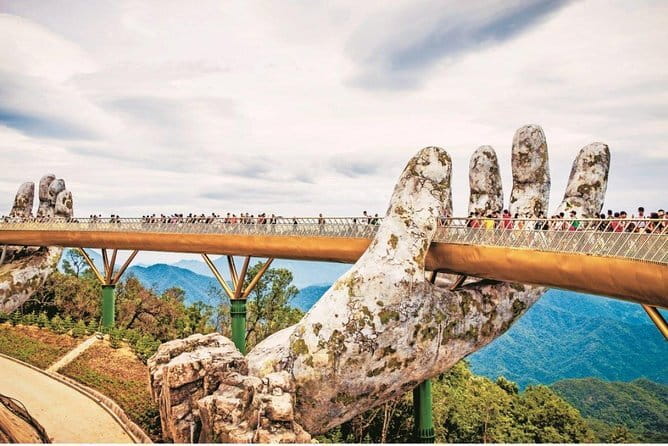 Ba Na Hills & Golden Bridge with Fantasy Park Tour-Optional Lunch - Walking across the Golden Bridge