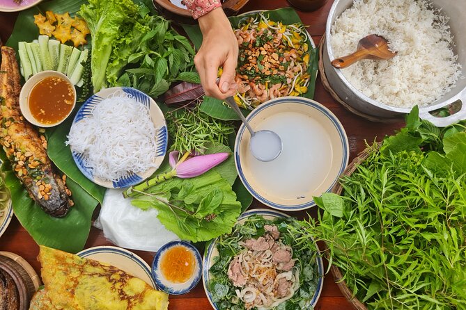 Ben Tre: Scooter, Culture, Sailboat and Mekong Food (Half Day) - Ben Tre market fruit and backstreet views