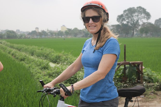 Bicycle Tour Full Day Explore Red River Delta & Rural Villages - Village lanes, traditional homes, and a family farm