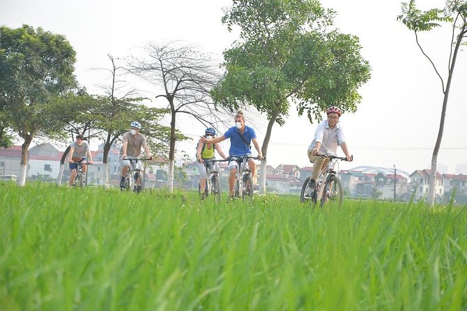 Bicycle Tours Hanoi: Full Day Bicycle Tours City & Countryside - Co Loa, the wet market, and lotus lake