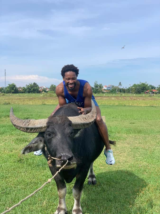 BUFFALO RIDING -BASKET BOAT & BIKE TOUR-HOI AN - Paddling through the nipa palm forest