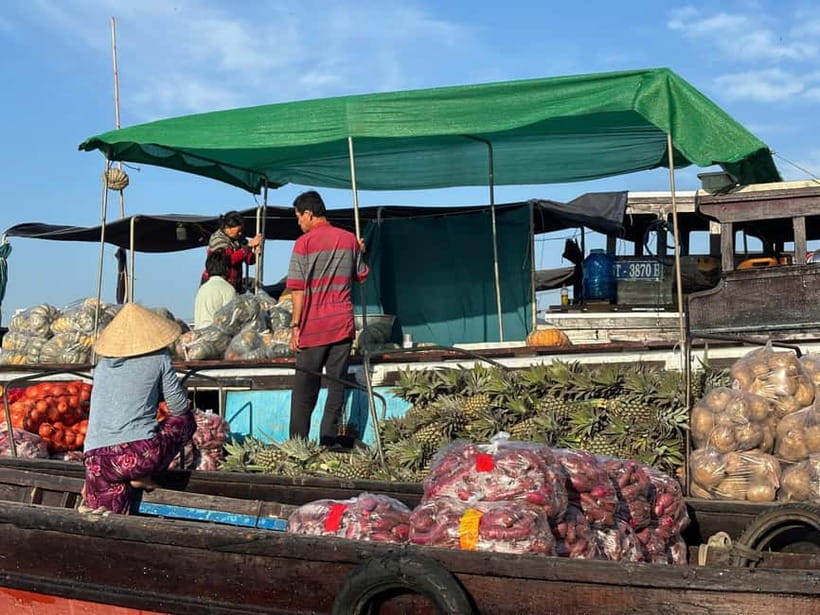 Can Tho: Floating Market, Cacao & Canals with French Guide - Breakfast choices served on the sampan