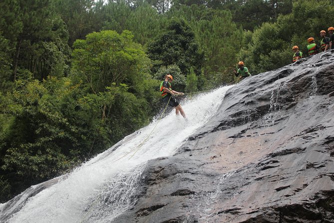 Canyoning Da Lat Vietnam - Riding the 70-meter zipline to the river