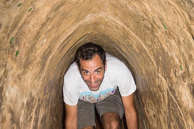 Cu Chi Tunnels and Mekong Delta 1 Day Tour With Small Group - Coconut candy, gardens, and the narrow canal