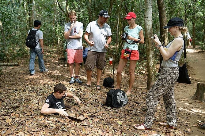 Cu Chi Tunnels - Half Day Luxury Tours - Entering the tunnel sections