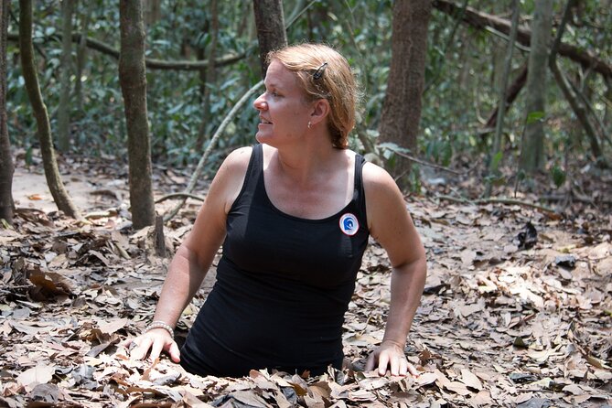 Cu Chi Tunnels Half-Day Tour: Big Group Vietnam War Experience - Hidden entrances and underground rooms