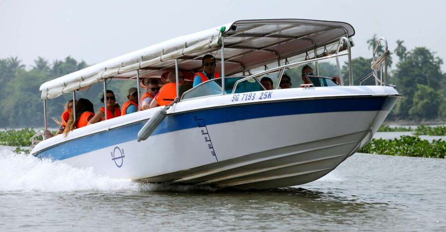 Cu Chi Tunnels Luxury Speed Boat Half Day Tour - Walking through the Cu Chi tunnel complex