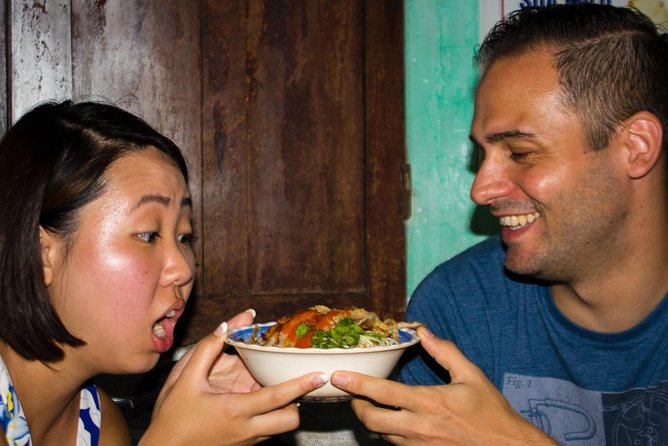 Da Nang Evening Food Tour - Rice cakes and small dishes at the first stops