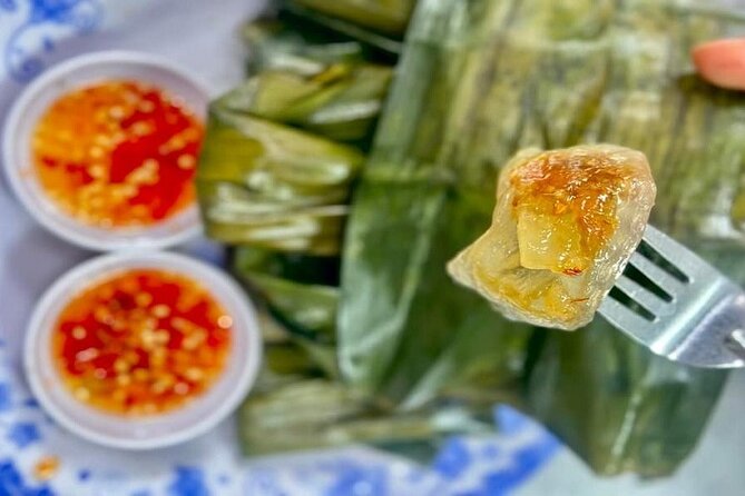 Da Nang Food Tour Motorbike & Sightseeing By Ao Dai Lady Rider - Dragon Bridge brings the city’s big visual moment