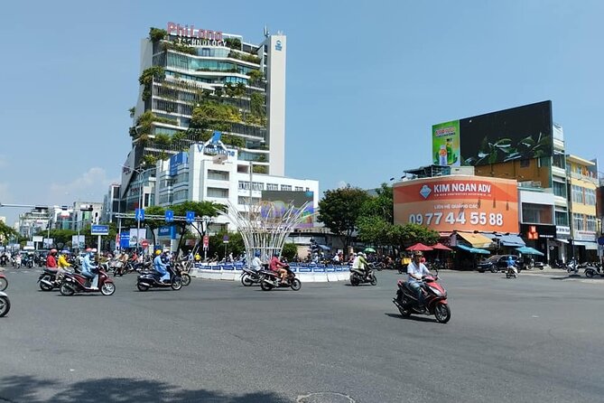 Da Nang Food Tour Motorbike & Sightseeing By Ao Dai Lady Rider - APEC Park adds a quieter riverside pause