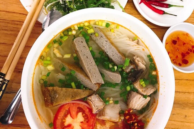 Da Nang Food Tour Motorbike & Sightseeing By Ao Dai Lady Rider - Love Bridge and the Han River start the evening