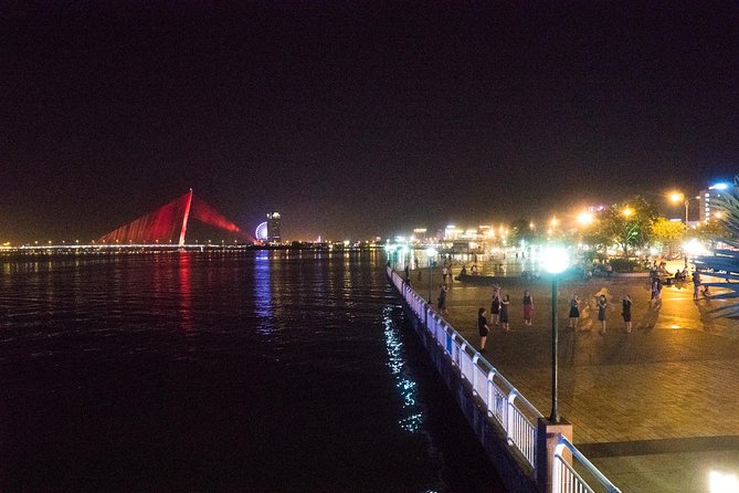 Da Nang Night Motorbike Tour & River Cruise Riding By Lady Rider - Sun Wheel and Da Nang’s night market