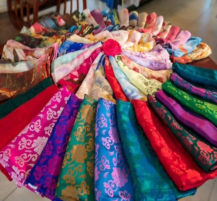 Discover Traditional Silk Process in Hoi An Silk Village - Comparing pure silk with imitation fabric