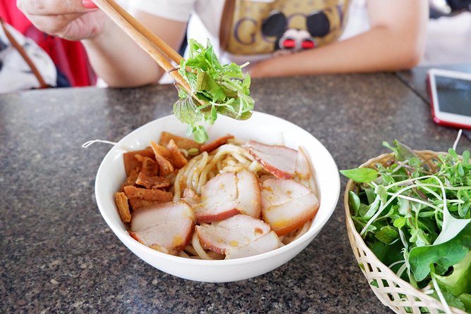 Evening Walking Food Tour, folk game and lantern boat - What the guide adds to the meal