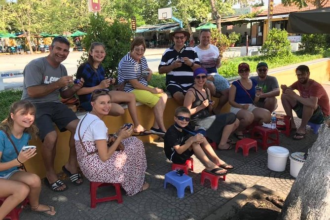 Evening Walking Food Tour, folk game and lantern boat - Vietnamese bingo and the dap nieu pot-breaking game