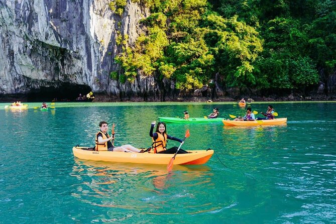 Excellent Halong Bay Day Cruise All Inclusive From Hanoi - Titop Island, beach time, and the climb to the peak
