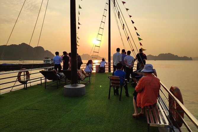 Excursion to Ha Long Bay with Titop Island and kayaking in Luon Cave - Sunset snacks and the ride back to Hanoi