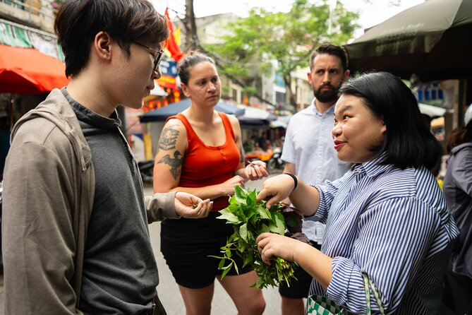 Experience Hanoi Cooking Class with Free Wine Tasting - Cooking four dishes, then eating your work