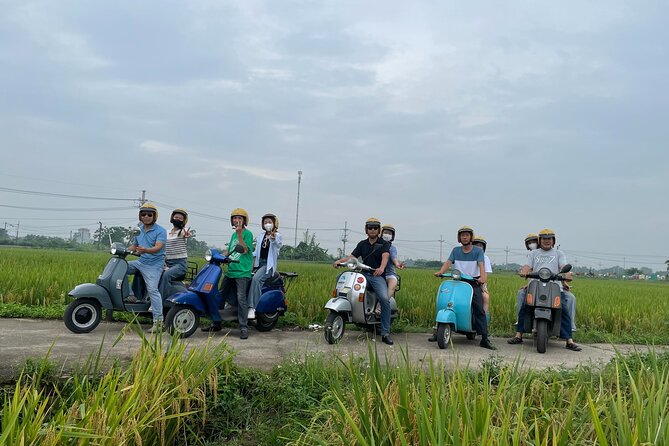 Exploring Vespa Tour Through Little Red River Delta - Leaving Hanoi Behind on a Classic Vespa