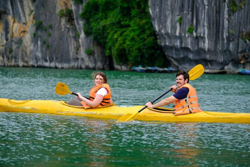 From Hanoi: 2-Day Halong Sapphire Cruise with Balcony Cabin - Spring rolls, sunset fruit, and a social evening