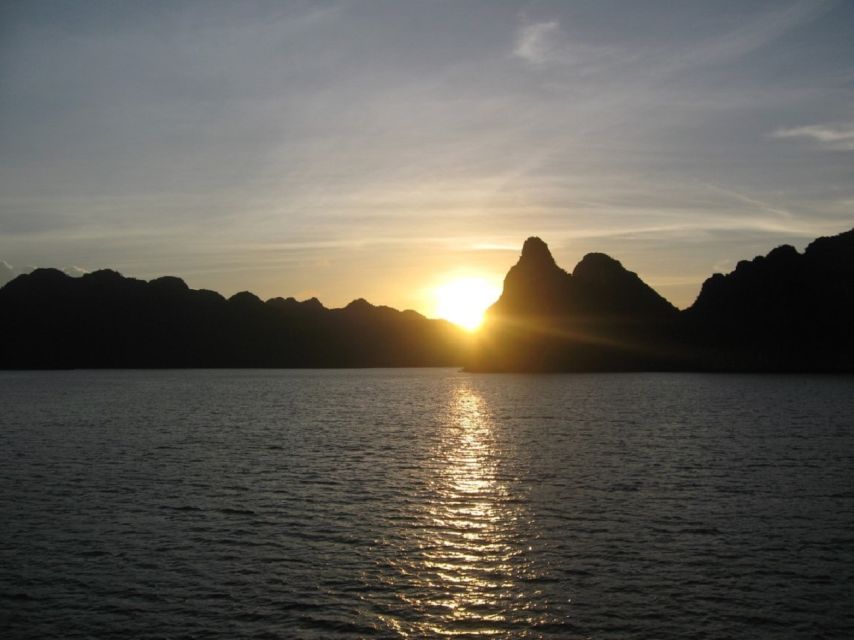From Hanoi: Ha Long - Bai Tu Long Bay 2-Day 1-Night Cruise - Day one: lunch, Cap La Island, and the sunset deck
