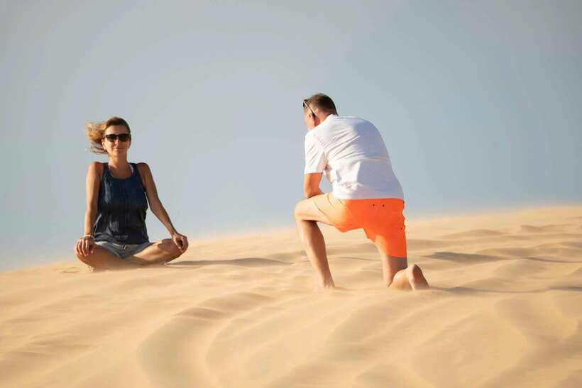 From HCM: Mui Ne Day Trip with Fairy Stream and Sand Dunes - The fishing village and wind turbines