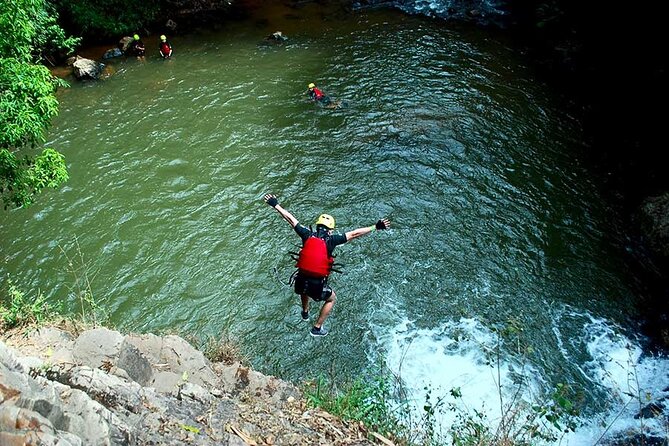 Full Day Canyoning Activity in Da Lat with Lunch - Learning the ropes on the 18-meter dry abseil