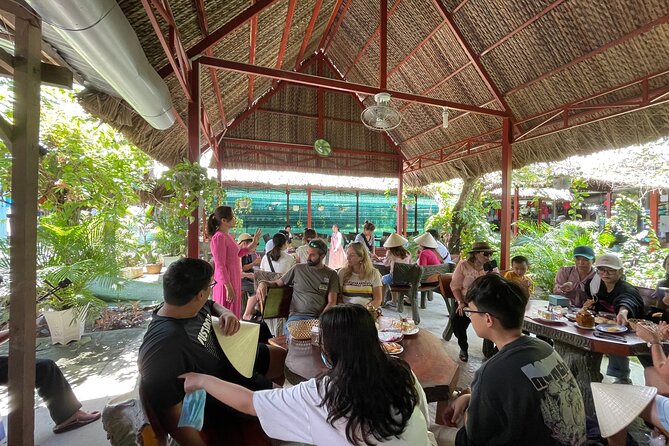 Full-Day Tour in Mekong Delta with Pick Up in Central District 1 - Con Lan: honey tea and a commercial welcome