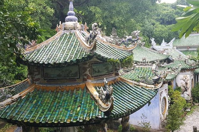 Guided Fullday Tour :Golden Bridge,Dragon Bridge,Marble Mountain,Monkey Mountain - Dragon Bridge and Da Nang’s modern symbol