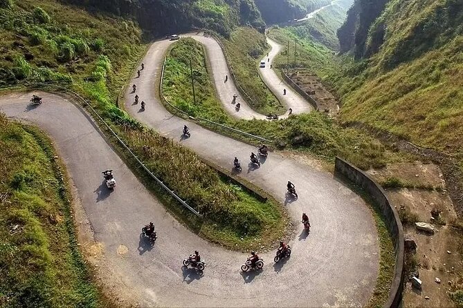 Ha Giang Loop 3 days and 2 nights Motorbike Tour with Easy rider - Day 2: Tham Ma Pass, H’mong King Palace, and Lung Cu