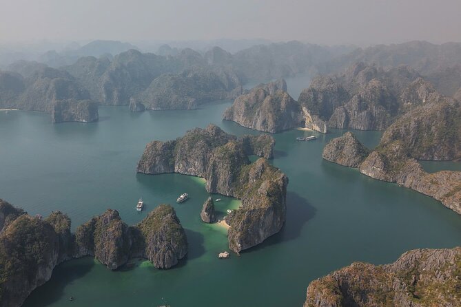 Ha Long Bay Cruise Day Tour - Cave, Kayaking, Swimming & Lunch - Ti Top Island, beach time or a steep viewpoint