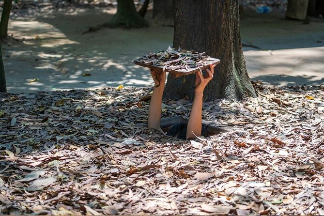 Half-Day Cu Chi Tunnels Guided Exclusive Experience with Pick Up - Hidden entrances, traps, and handmade weapons