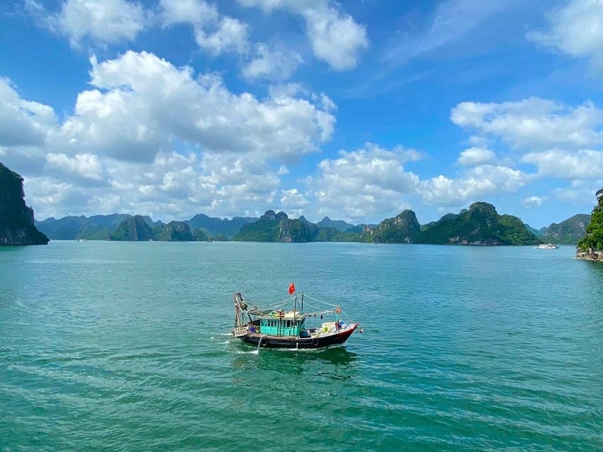 Halong 6 Hours Cruise: Kayak, Cave, Lunch, Beach & Island - Ti Top Island for swimming or a hard-earned view