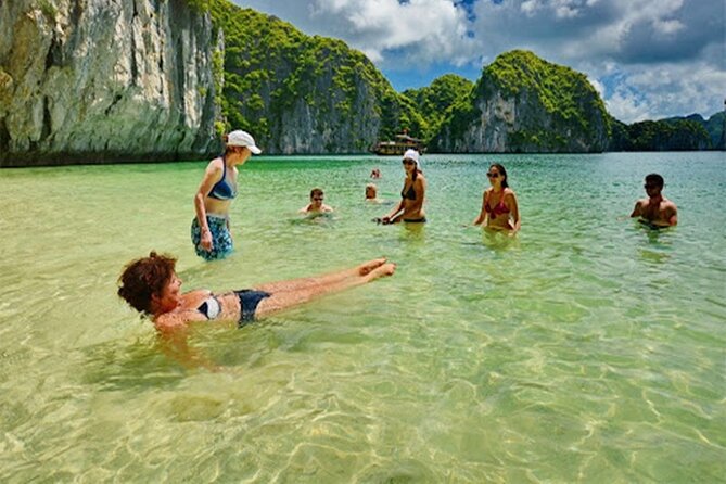 Halong Bay Day Tour 6Hour Deluxe Cruise Limousine Bus Small Group - Titop Island adds a steep viewpoint