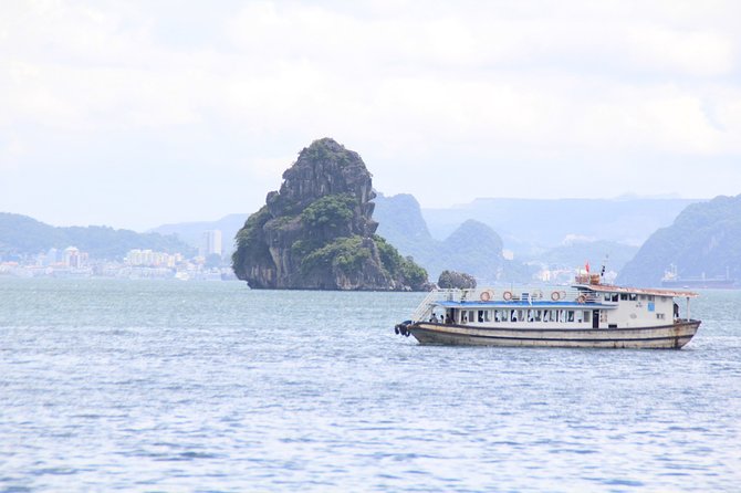 Halong bay Full Day Cruise trip: kayaking, surprise cave, titop island, lunch - Sung Sot Cave, the bay’s grand indoor stop