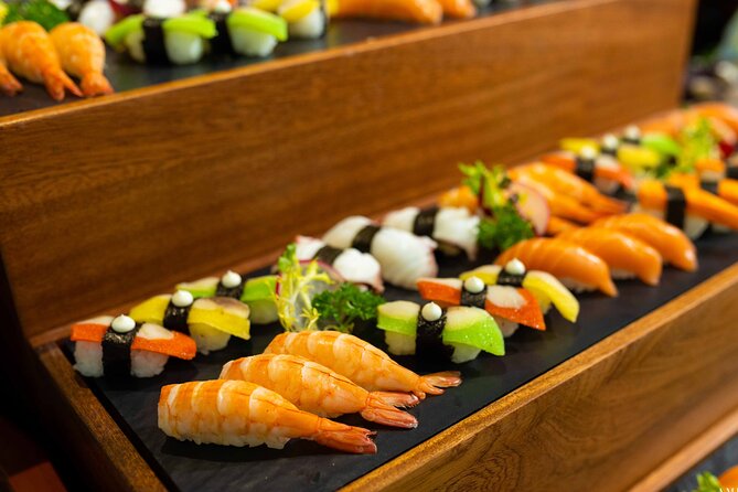 Halong Bay Luxury Dinner Cruise - Ambassador - Sailing beside Ha Long City after dark