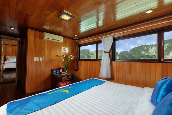 Halong deluxe cruise 2D/1N: Surprise cave, Titop island, Full Meals, best prices - Walking through Surprise Cave