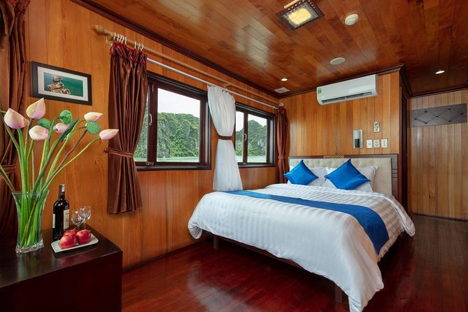 Halong deluxe cruise 2D/1N: Surprise cave, Titop island, Full Meals, best prices - Kayaking among the islands