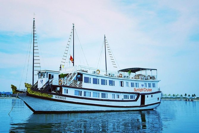 Halong deluxe cruise 2D/1N: Surprise cave, Titop island, Full Meals, best prices - Sunset, squid fishing, and a night on board
