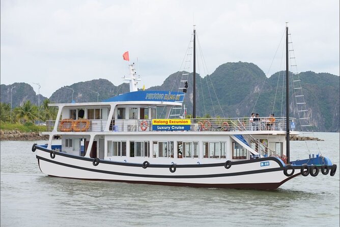 Halong Excursion Cruise with Kayaking, Swimming & Cave Visit - Tuan Chau Harbor and the first view of the bay