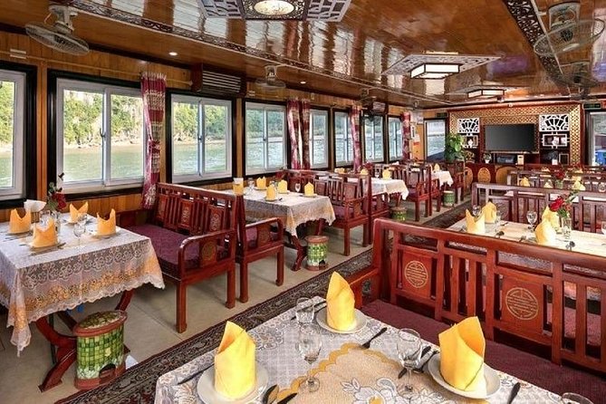 Halong Islands, Caves, Kayak, Lunch Day Tour w Dragonfly Cruise - Lunch, water, and what you pay extra for