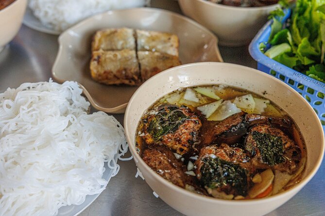 Hanoi After Dark Vespa Tour (4 hours): Street Food & Night Vibes - Train Street brings the night to a close
