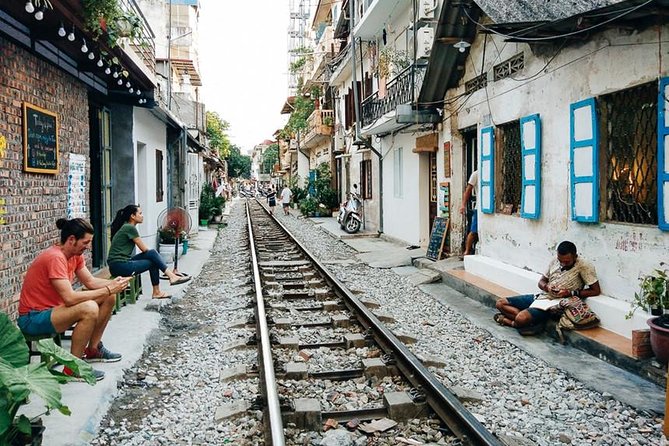 Hanoi City Tour: Private Half-Day to Hidden Corners &Train Street - Dong Xuan Market brings the route down to earth