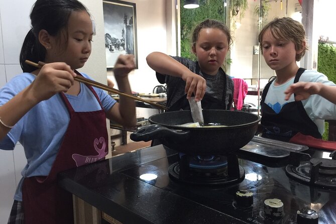 Hanoi Cooking Class and Market Tour in Ancient House - Cooking four traditional dishes by hand