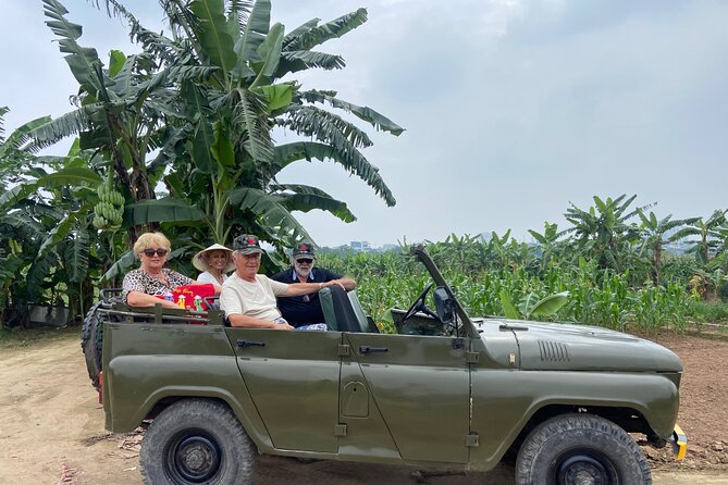 Hanoi Jeep Tour: City Highlights, Train St & Hidden Gems - West Lake and the changing pace of the city