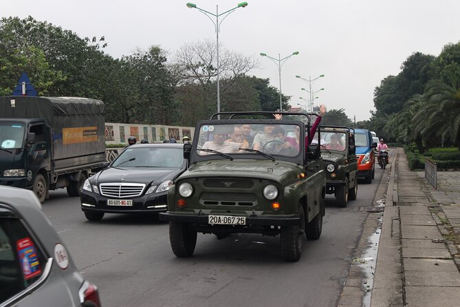 Hanoi Jeep Tours Led By Women: Hanoi City Jeep Tours - Train Street and the final egg coffee stop