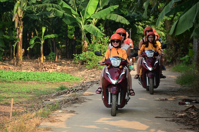 Hanoi Motorbike Led By Women: Hanoi Countryside Motorbike Tours - Leaving Hanoi by motorbike across Long Bien Bridge