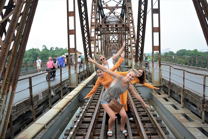 Hanoi Motorbike Tours Led By Women: Hanoi City Insight Motorbike Tours - West Lake roads, Duong Tau, and the railway atmosphere